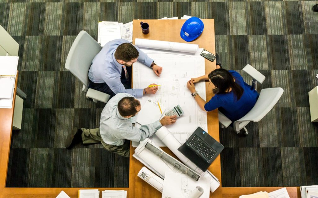 An areal view of a meeting discussing how much managed it services cost for professional services.